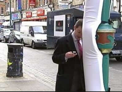 distracted walking texting lamp post lightpost bumper london